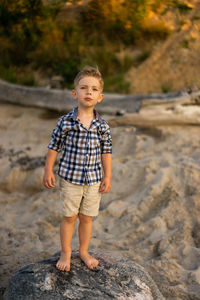 Portrait of toddler boy at the beach. summer vacation