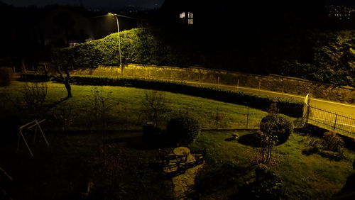 Illuminated soccer field at night