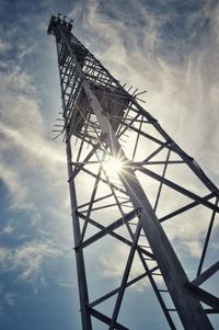 Low angle view of metal structure against sky