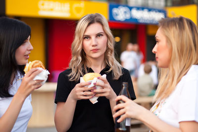 Young woman eating food