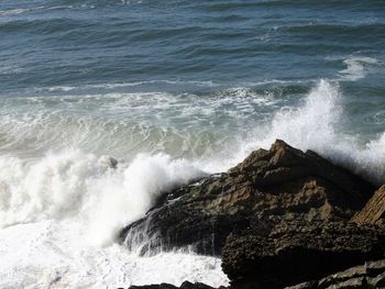 High angle view of waves in sea