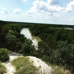 Scenic view of landscape against cloudy sky