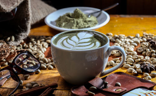 Close-up of coffee cup on table