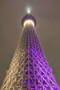 Low angle view of illuminated tower