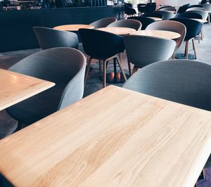 Empty chairs and table in cafe