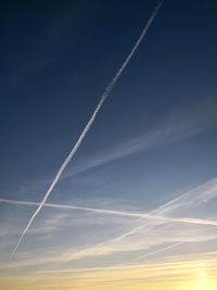 Low angle view of vapor trail in sky