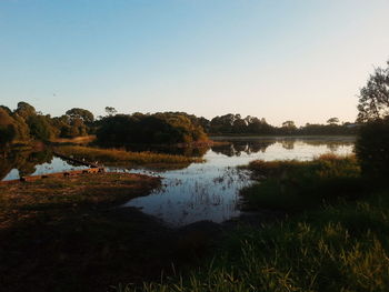 Scenic view of lake against clear sky