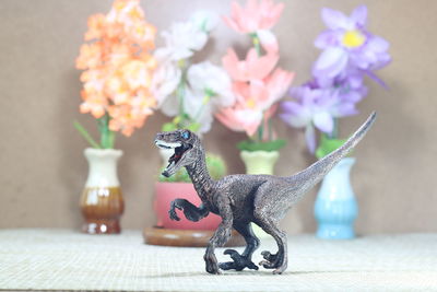 Close-up of butterfly on toy on table