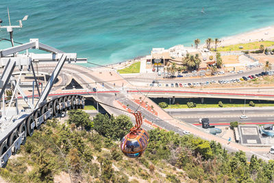 High angle view of bridge over sea in city