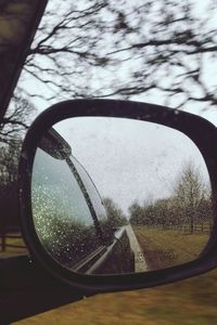 Road seen through wet window