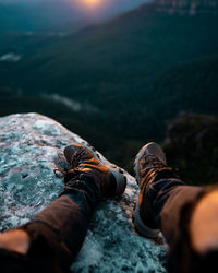 Low section of people on rock