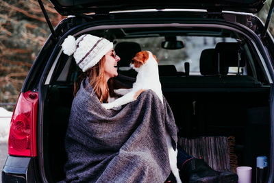 Woman sitting in car