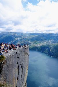 Tourists at preikestolen, the pulpit rock, norway