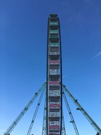 Low angle view of bridge against blue sky