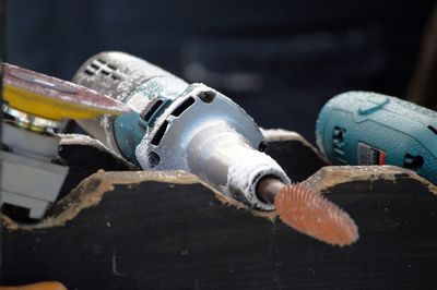 Close-up of work tools on wood