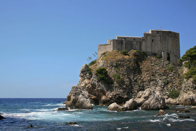 Scenic view of sea against clear sky