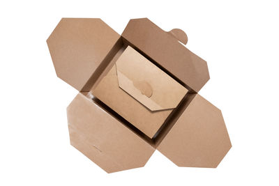 High angle view of paper box against white background