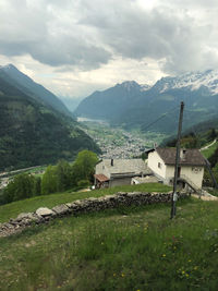 Scenic view of landscape and mountains against sky
