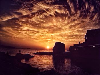 Scenic view of sea at sunset