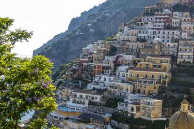 Buildings in city against sky