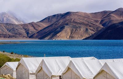 Panoramic view of sea against mountains