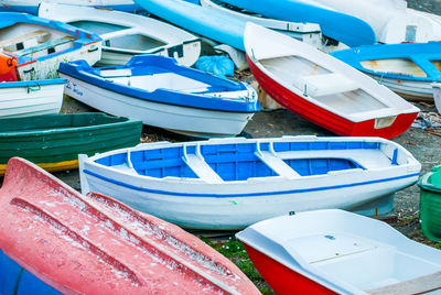 High angle view of boats moored on land