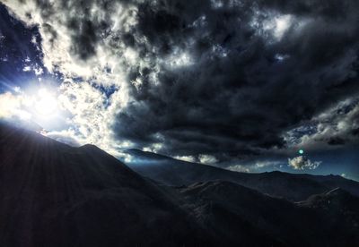 Scenic view of cloudscape over mountains