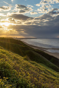 Scenic view of sea against sky during sunset