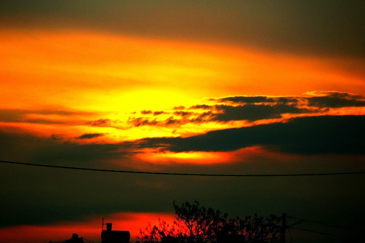 sunset, orange color, sky, cloud - sky, scenics, beauty in nature, dramatic sky, silhouette, tranquil scene, tranquility, cloudy, idyllic, weather, nature, atmospheric mood, cloud, moody sky, overcast, cloudscape, atmosphere