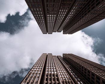 Low angle view of modern buildings against sky