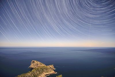 Scenic view of sea against sky at night