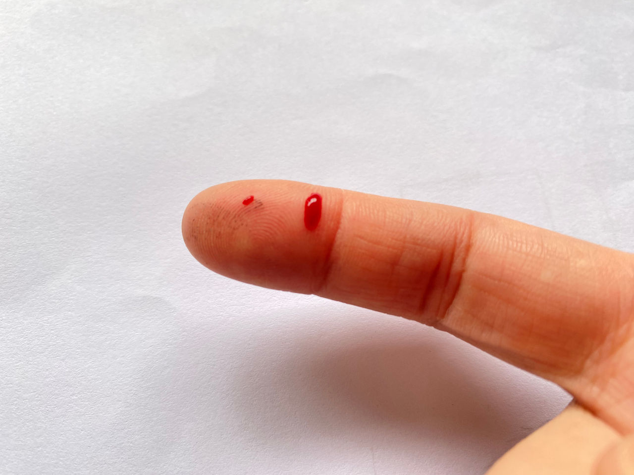 finger, hand, nail, blood, one person, healthcare and medicine, close-up, indoors, orange, lip, limb, red, manicure, physical injury, studio shot