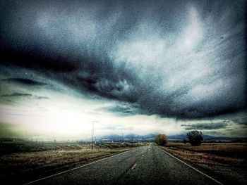 View of road against cloudy sky