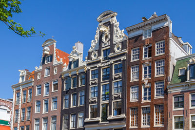 Low angle view of buildings against sky