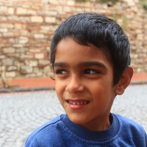 Close-up portrait of smiling boy