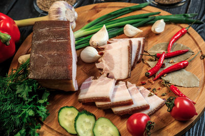 High angle view of chopped vegetables on cutting board