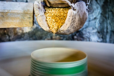 Close-up of coffee cup in container