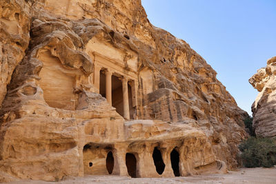 View in summer of painted house in little petra archaeological site, jordan