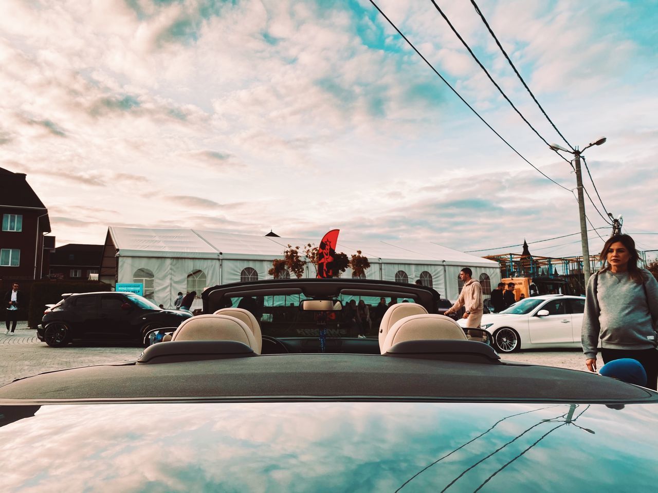 GROUP OF PEOPLE ON ROAD IN CITY