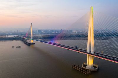 View of suspension bridge in city