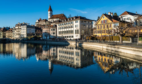 Reflection of buildings in lake