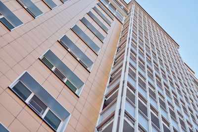 Low angle view of modern building against clear sky