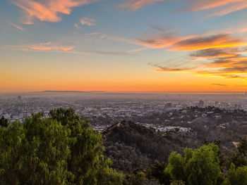 High angle view of cityscape against sky during sunset