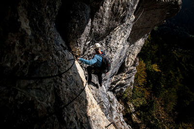 High angle view of person on rock