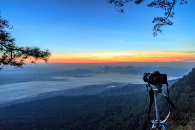 Scenic view of landscape against sky during sunset