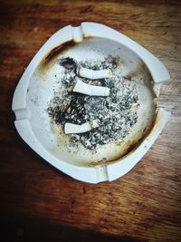 High angle view of coffee cup on table