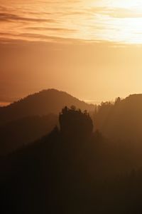 Misty dawn from hill over valley and the forest