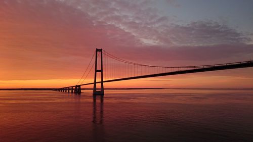 View of suspension bridge at sunset