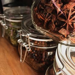 Close-up of spices in jars on table