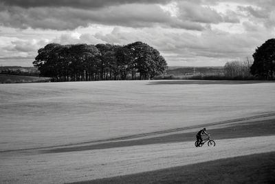 Man riding bicycle on mountain